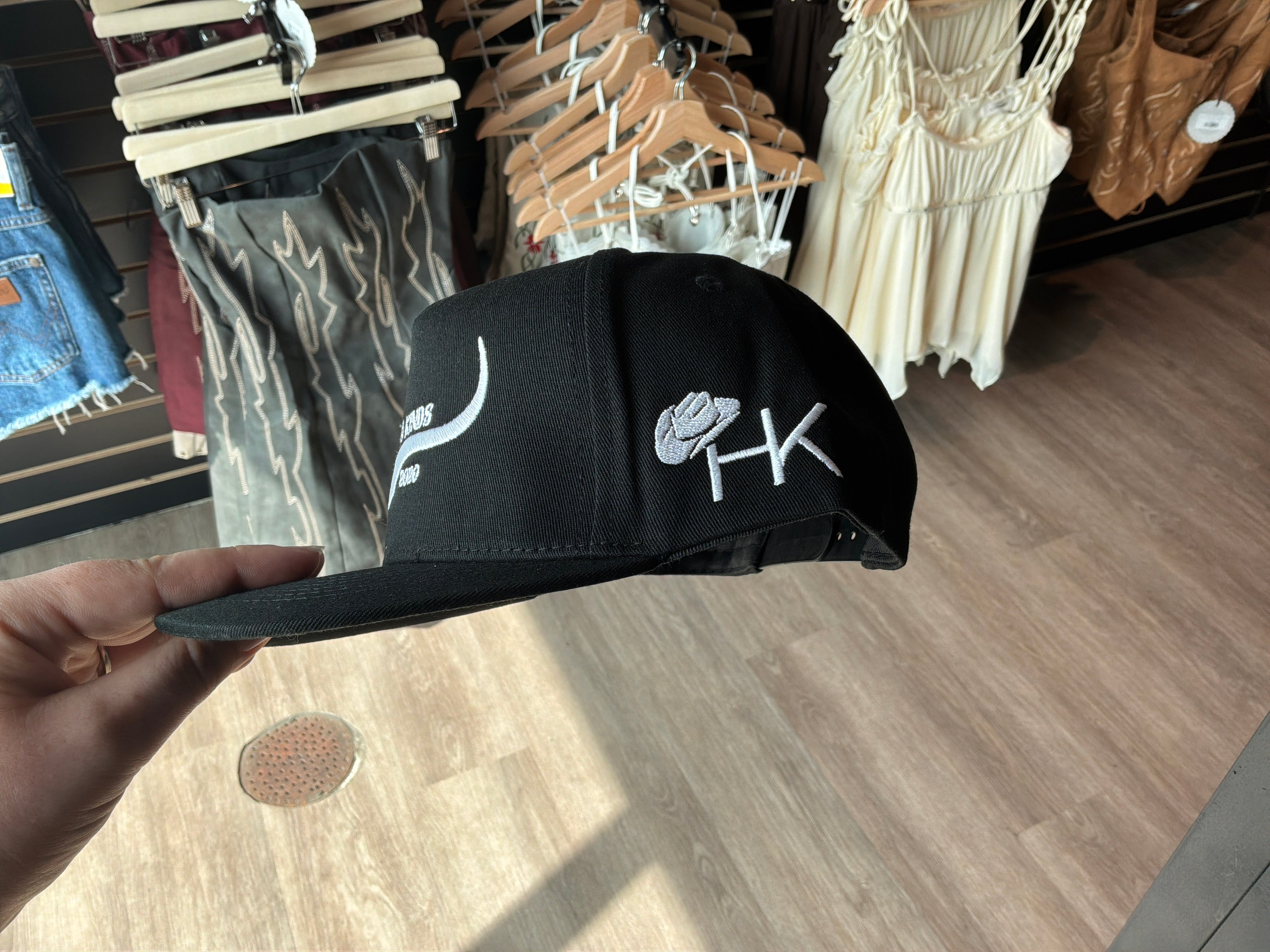 Hides & Kinds original logo black trucker hat